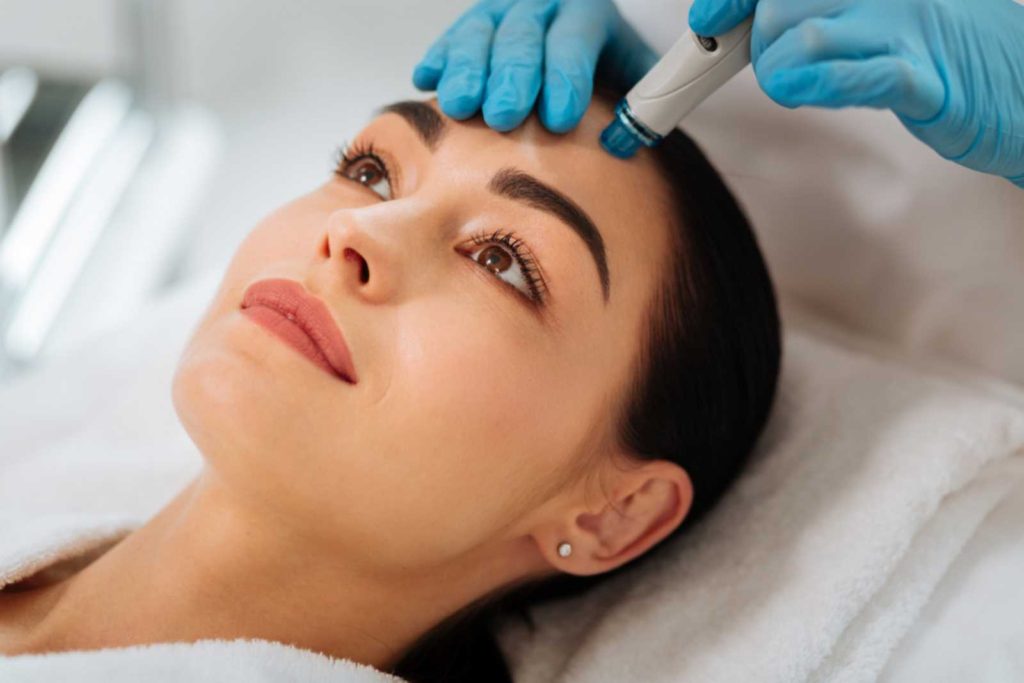 Girl Taking a diamond microdermabrasion for skin rejuvenation