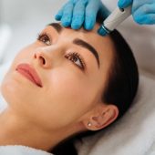 Girl Taking a diamond microdermabrasion for skin rejuvenation